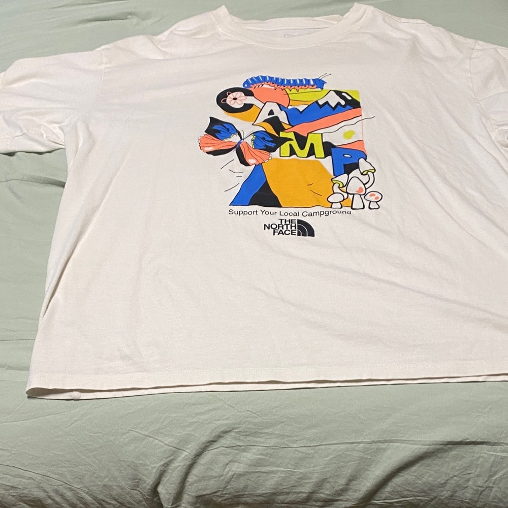 The North Face White T-Shirt with Vibrant Graphic